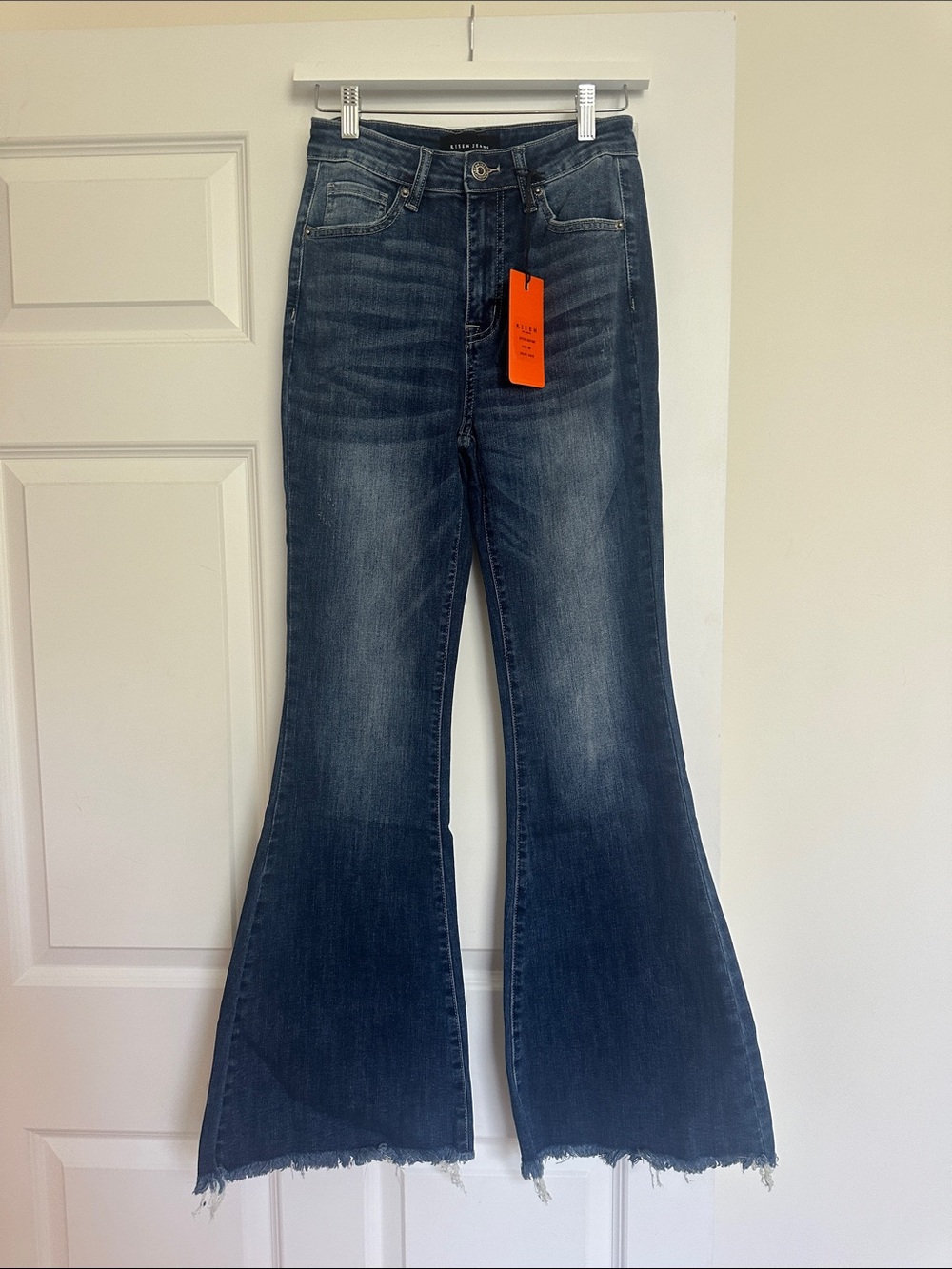 High-Rise Dark Indigo Flare Jeans with Raw Hem